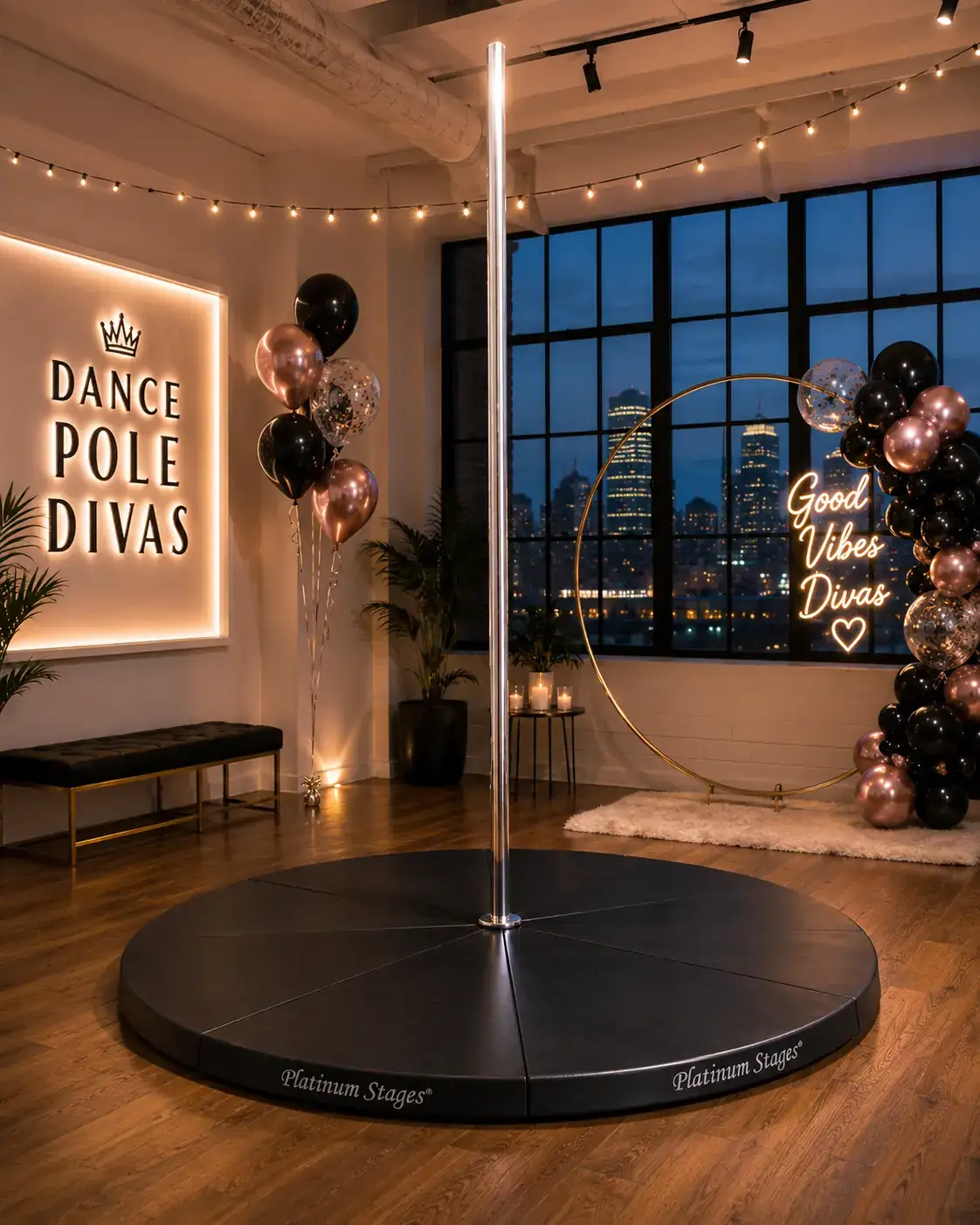 Self-standing dance pole set up in a loft party space